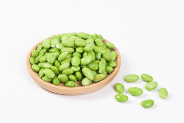 fresh green soybeans on white background.