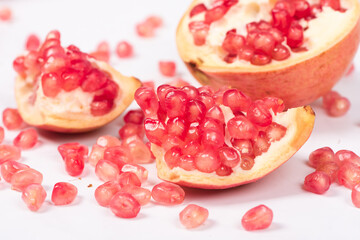 Fresh ripe pomegranate with clipping path on white background.