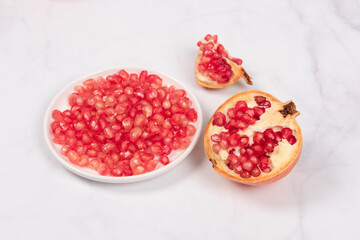 Fresh ripe pomegranate with clipping path on white background.