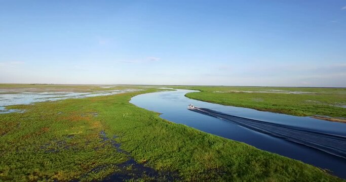 Morning cruise with a speedboat on the Corrientes river in the Ibera Wetlands in North East Argentina. It Comprises of swamps, marshes, and lagoon.