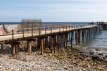 Fototapeta na wymiar closed off security at the start of the old Rapid Bay jetty ruins on the Fleurieu Peninsula South Australia on April 12th 2021