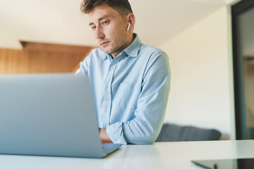 Fototapeta premium Successful business man working from home with laptop