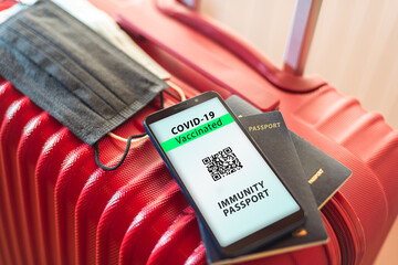 Covid 19 passport, immunity passport, traveling  bag and passport