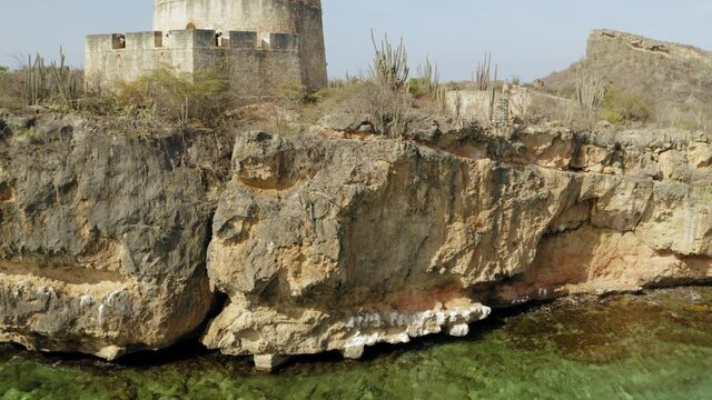 aerial drone image of Fort Beekenburg in Cura&ccedil;ao Caribean on the beach of Tug Boat