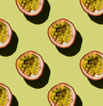Tropical exotic Passion Fruit on green background Pattern