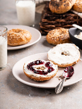 Bagel with cream cheese and jam