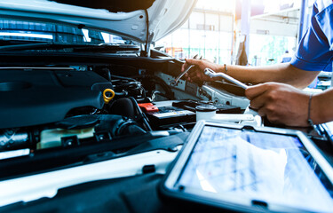 Auto mechanic are checking the condition of the car according to the month. The technician uses the...