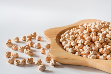 Close-up chickpeas in a wooden dish is a healthy nut that is perfect for vegetarians or those who can't eat meat.