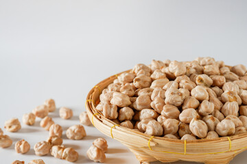 Close-up chickpeas in a wooden basket is a healthy nut that is perfect for vegetarians or those who can't eat meat.
