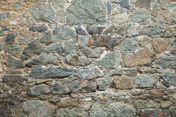 Backgrounds of the old fortress wall. Background of vintage stone wall