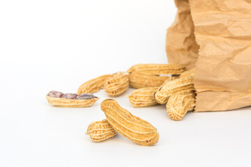 Group of peanut with paper bag on white background,copy space.