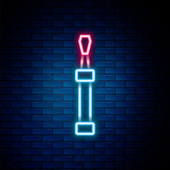 Glowing neon line Screwdriver icon isolated on brick wall background. Service tool symbol. Colorful outline concept. Vector