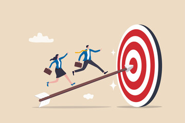 Business achievement, improvement goal, success target or career growth concept, confidence businessman and businesswoman working team running up archer arrow which hitting bullseye target.