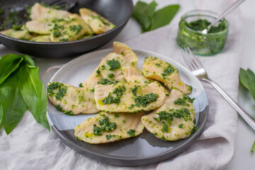 Pierogi ruskie, Baked dumplings stuffed with curd cheese and potatoes and wild garlic