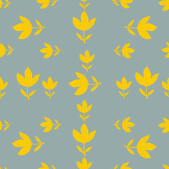 Fototapeta na wymiar Seamless pattern of yellow abstract flowers, leaves on a gray background. The fashionable color combination of 2021
