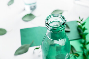 Bottle of water on color background