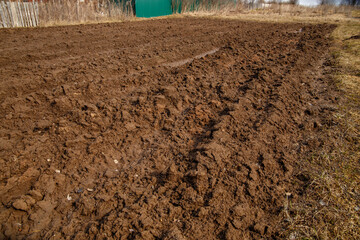 Plowed ground before spring potato planting