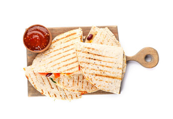 Board with tasty vegetarian quesadillas and sauce on white background