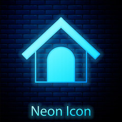 Glowing neon Dog house icon isolated on brick wall background. Dog kennel. Vector