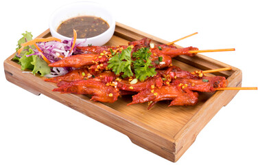 Spicy Chipotle Flavored Chicken Wings Closeup. White plate and white background.