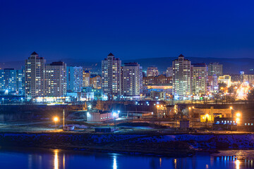 Fototapeta na wymiar panoramic view of illuminated city at night 