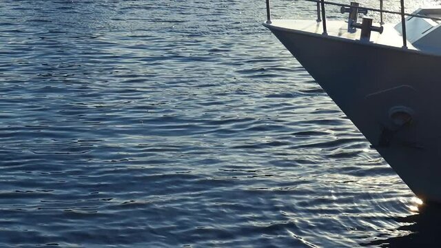 A boat floating in the river. 