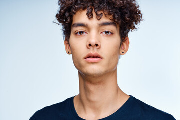 cute guy curly hair black t-shirt close-up model