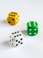 Three colorful dices isolated on white background