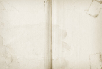 Old stained open book. Background texture