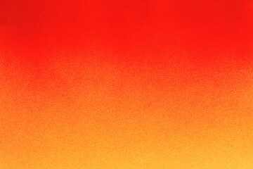 red spray paint on a yellow colored paper background