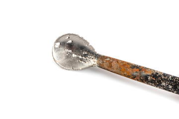 Damaged with oxidation metal laboratory spoon, spatula isolated on white background. Metal Laboratory Equipments. Lab spatulas reagent lab sampling used in laboratory.