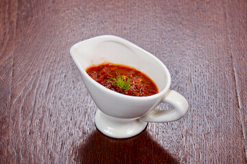 Caucasian traditional Adjika sauce in the bowl