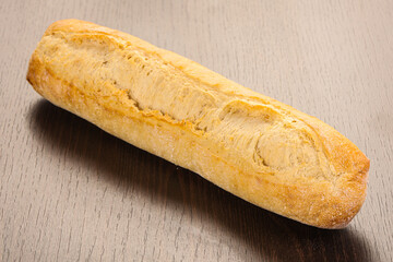 Crust tasty baguette over board