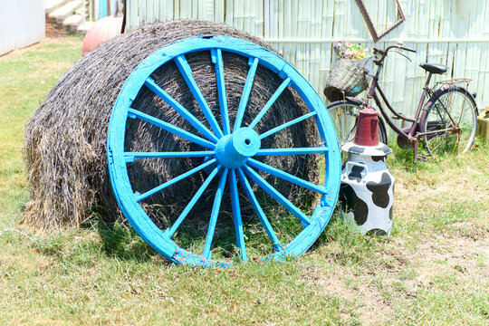 Old blue wagon wheel decoration the silent backyard