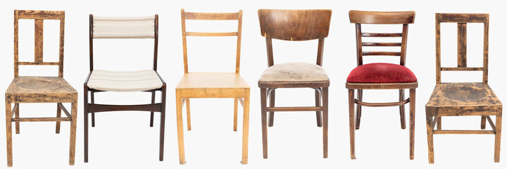 Set of various wooden chairs from late 70's and early 80's from the previous century. Polish design and production. Front view