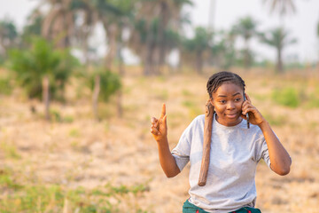 african countryside farmer making a phone call