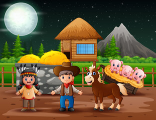 A cowboy and american indian girl in the farm