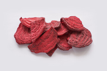 Crispy dried food. Organic tasty chips. Homemade snacks. Sliced beetfood. Healthy vegetables