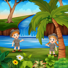Obraz na płótnie Canvas Cartoon the safari boy and girl by the river
