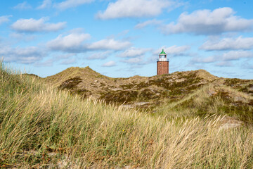 Fototapeta na wymiar Lighthouse Quermarkenfeuer Rotes Kliff near Kampen, Sylt, Schleswig-Holstein, Germany
