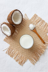 Coconut milk and fresh coconuts. Vegetarian food. Healthy eating.