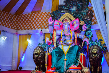 Fototapeta premium Stock photo of beautiful statue of hindu god ganesha.Establishment of lord ganesha during ganpati festival in India.