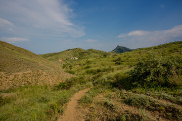 Walking in the mountains. Among the Crimean hills. Summer walk. Sunny day.