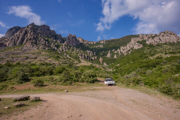 Walking in the mountains.Mount Demerdzhi in the Crimea. Walk to Mount Demerdzhi. Mountains in the Crimea. Mysterious Crimean mountain. The tract is the Valley of Ghosts. Stone sculptures.