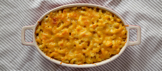 Homemade Macaroni and Cheese Pasta on cloth, top view. Flat lay, overhead, from above.