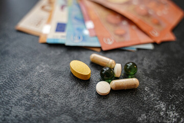 Fototapeta na wymiar Money high price medication pills health covid-19