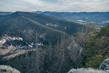 A canyon with a mountain in the background