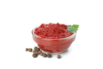 Bowl of tomato paste isolated on white background