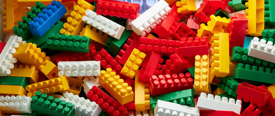 Fototapeta na wymiar Multicolor toy bricks background abstract texture