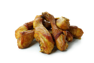 Roast chicken drumsticks isolated on white background